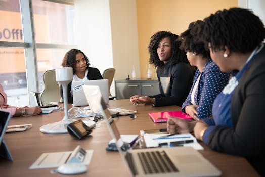 A group of professionals engaging in a presentation