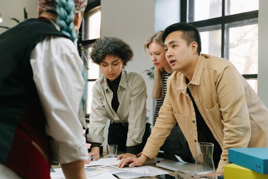 a group of women discussing business ideas