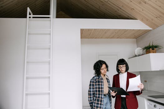 a woman reviewing a contract with a client