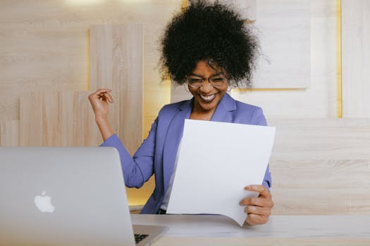 female entrepreneur working on laptop