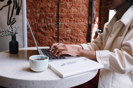 creative workspace with laptop and coffee