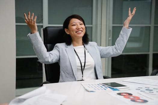 happy entrepreneur celebrating her success