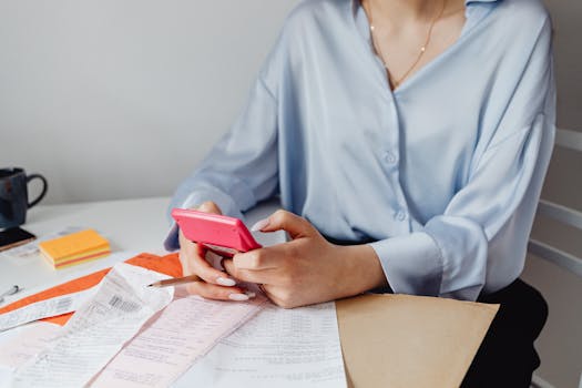 image of a woman working on her financial records